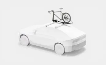 Thule Dachfahrradträger mieten, Fahrrad auf Autodach bei Dachboxit